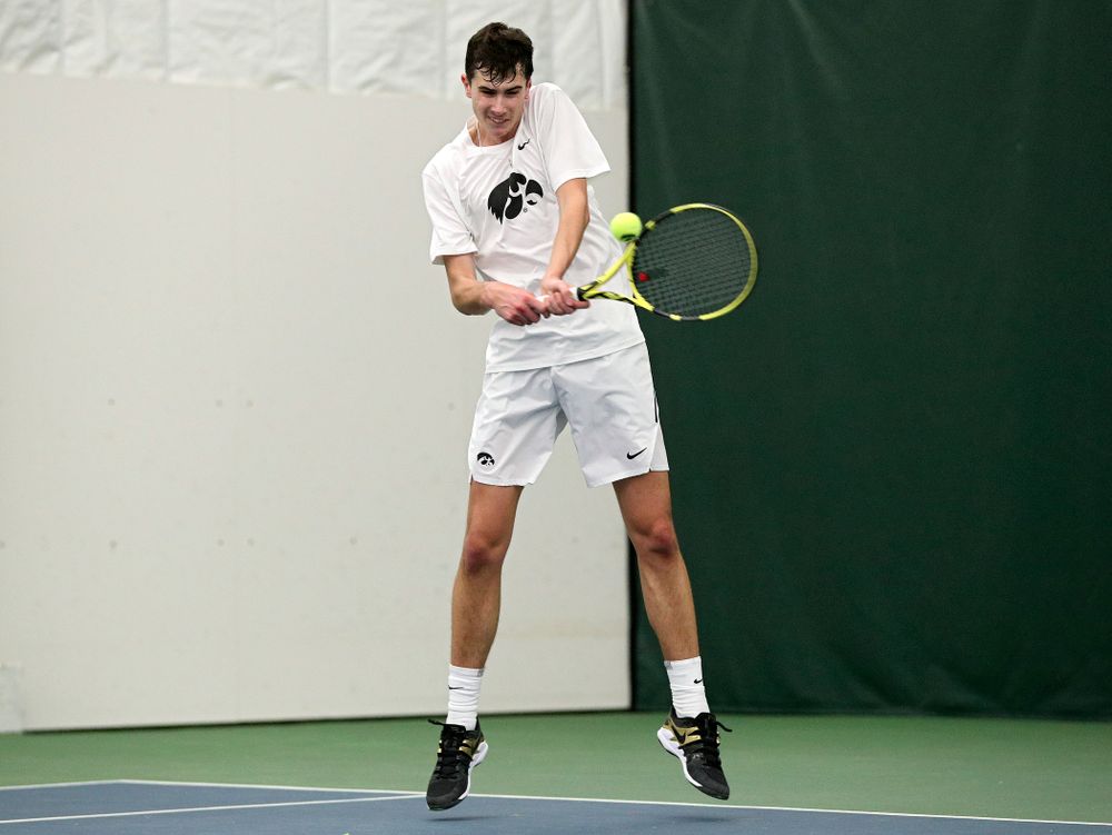 Iowa’s Matt Clegg returns a shot during his doubles match at the Hawkeye Tennis and Recreation Complex in Iowa City on Sunday, February 16, 2020. (Stephen Mally/hawkeyesports.com)