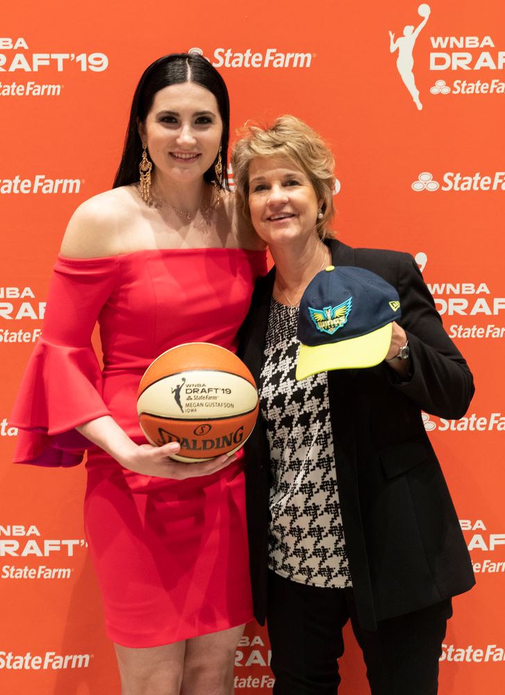 Iowa Hawkeyes forward Megan Gustafson (10) with head coach Lisa Bluder after being selected by the Dallas Wings in the second round of the 2019 WNBA Draft Wednesday, April 10, 2019 at Nike New York Headquarters in New York City. (Brian Ray/hawkeyesports.com)