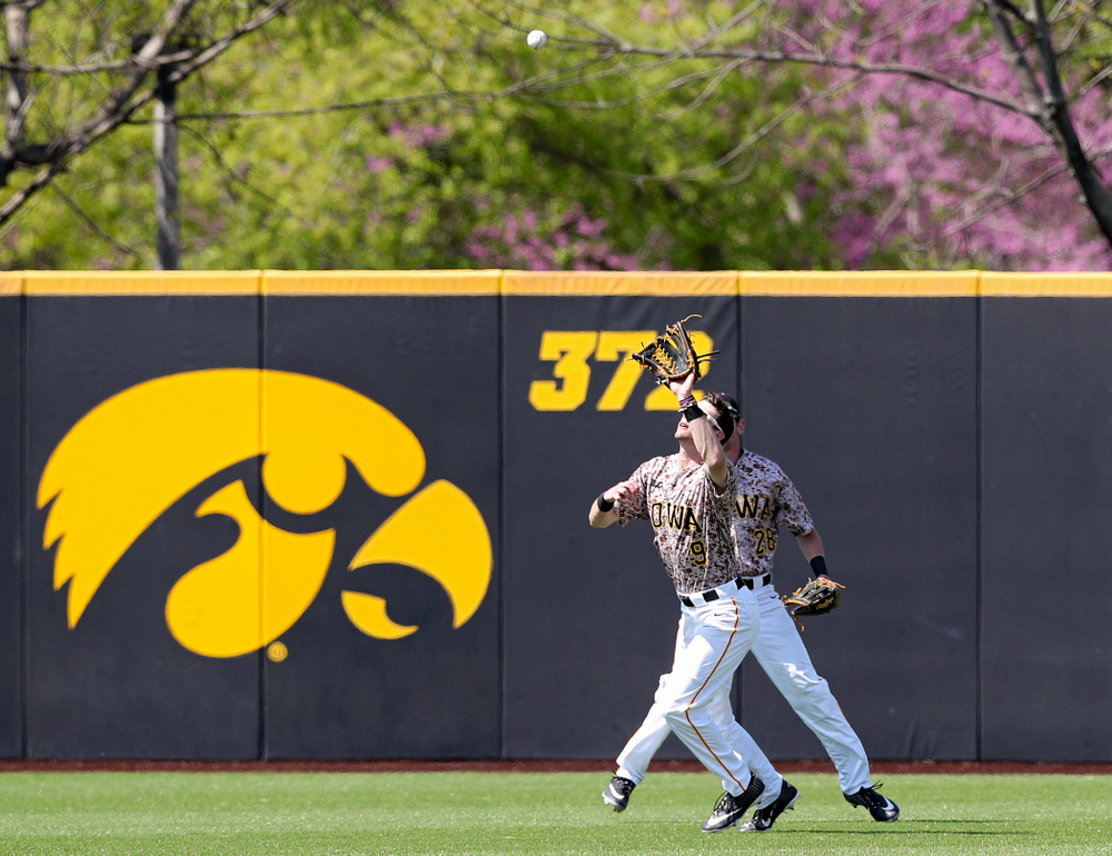 Iowa Hawkeyes center fielder Ben Norman (9) pulls in a fly ball for an out during the fifth inning of their game against UC Irvine at Duane Banks Field in Iowa City on Sunday, May. 5, 2019. (Stephen Mally/hawkeyesports.com)