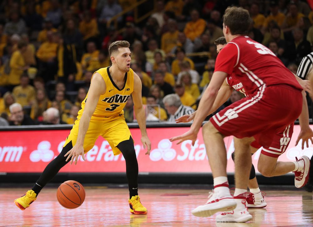 Iowa Hawkeyes guard Jordan Bohannon (3) against the Wisconsin Badgers Friday, November 30, 2018 at Carver-Hawkeye Arena. (Brian Ray/hawkeyesports.com)