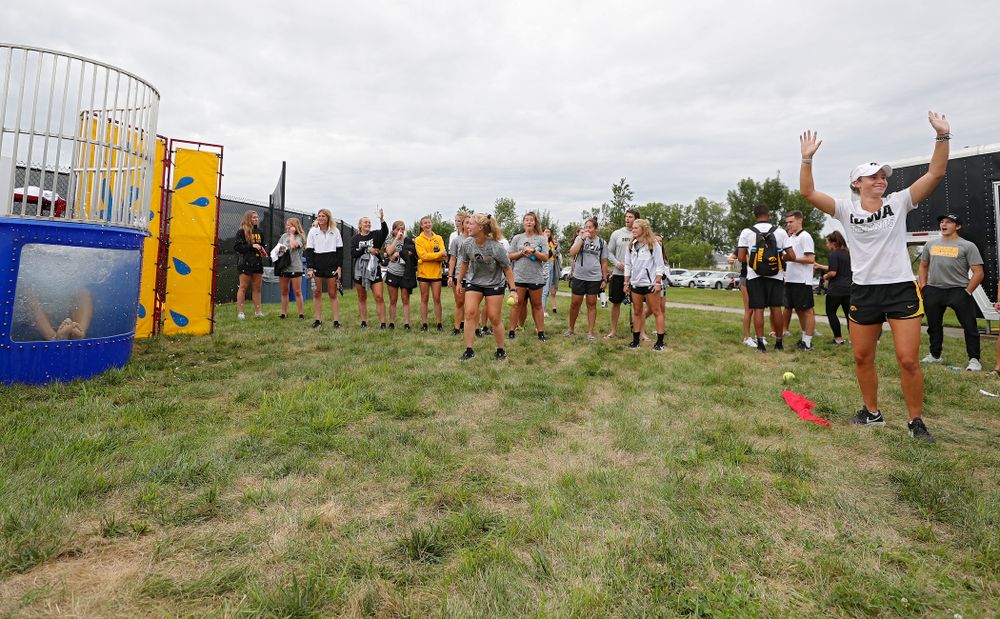 Iowa Women’s Tennis’ Elise van Heuvelen Treadwell reacts after sinking Women’s Tennis program coordinator Daniel Leitner in the dunk tank during the Student-Athlete Kickoff outside the Karro Athletics Hall of Fame Building in Iowa City on Sunday, Aug 25, 2019. (Stephen Mally/hawkeyesports.com)