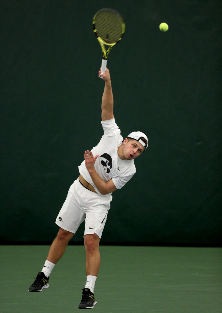 Iowa’s Will Davies against Cornell Sunday, March 8, 2020 at the Hawkeye Tennis and Recreation Center. (Brian Ray/hawkeyesports.com)