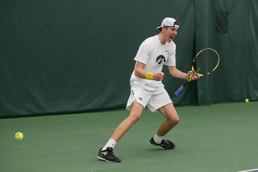 Iowa’s Nikita Snezhko celebrates a point during the Iowa men’s tennis meet vs Nebraska on Sunday, March 1, 2020 at the Hawkeye Tennis and Recreation Complex. (Lily Smith/hawkeyesports.com)