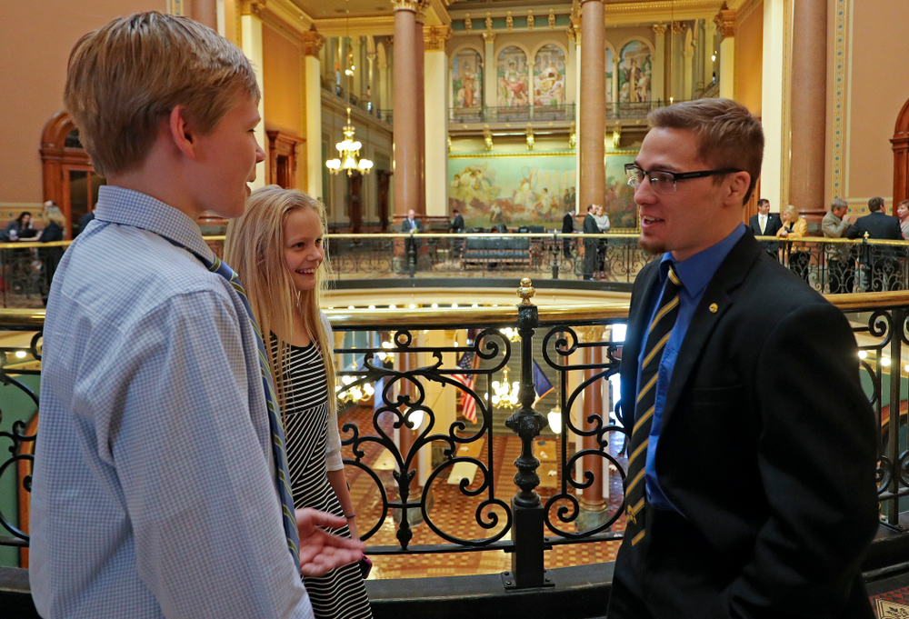 Iowa's Spencer Lee talks with young fans at the Iowa State Capitol Building on Tuesday, Apr. 9, 2019. (Stephen Mally/hawkeyesports.com)