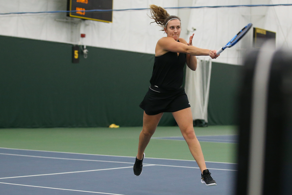 Iowa’s Ashleigh Jacobs returns a ball during the Iowa women’s tennis meet vs UNI on Saturday, February 29, 2020 at the Hawkeye Tennis and Recreation Complex. (Lily Smith/hawkeyesports.com)