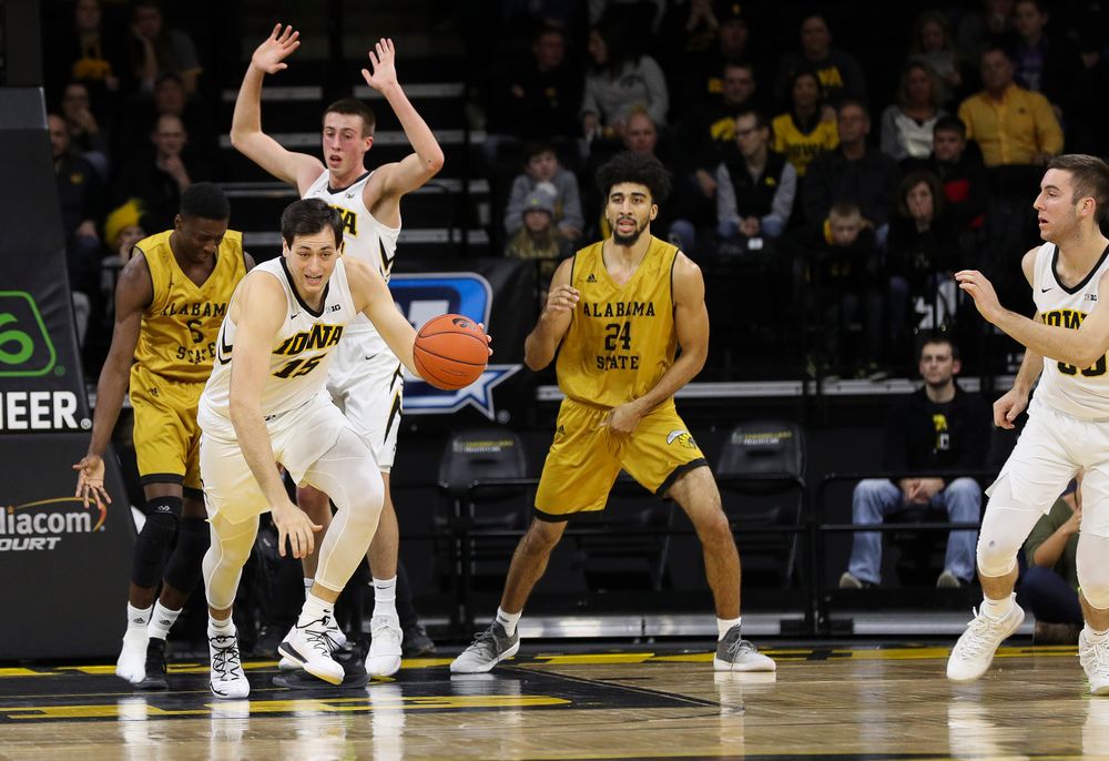 Iowa Hawkeyes forward Ryan Kriener (15) dribbles the ball during a game against Alabama State at Carver-Hawkeye Arena on November 21, 2018. (Tork Mason/hawkeyesports.com)
