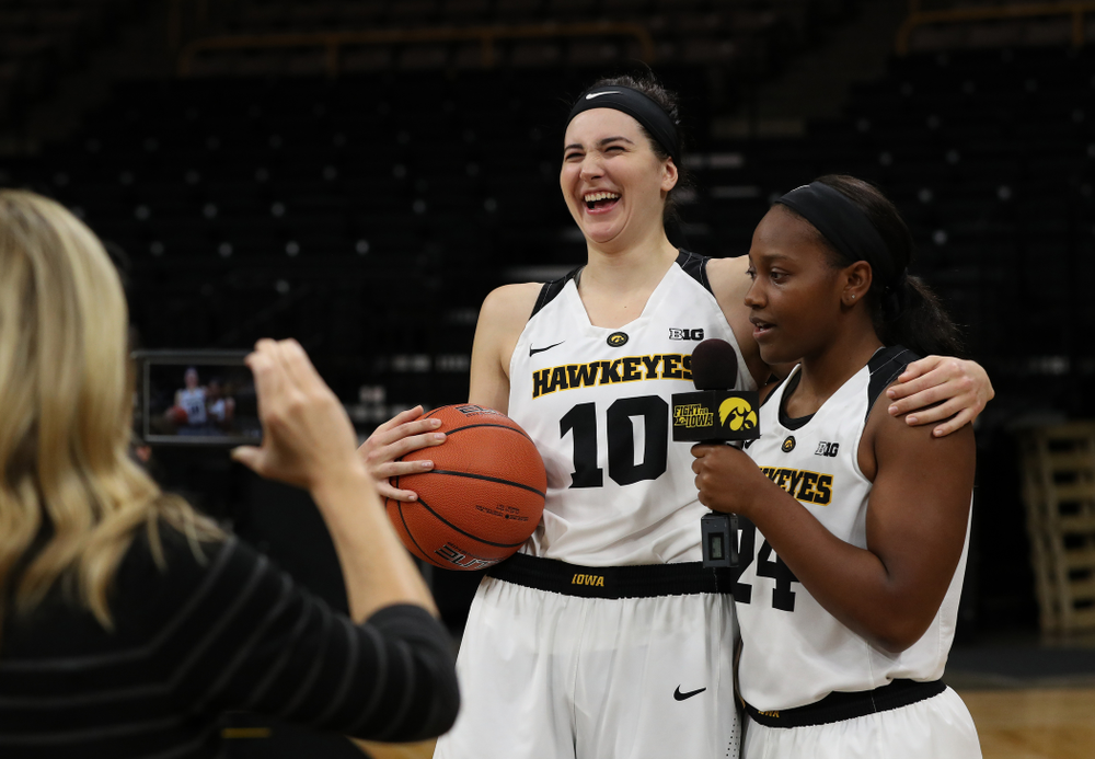 Iowa Hawkeyes guard Zion Sanders (24) interviews forward Megan Gustafson (10) for a Facebook Live during the team's annual media day Wednesday, October 31, 2018 at Carver-Hawkeye Arena. (Brian Ray/hawkeyesports.com)