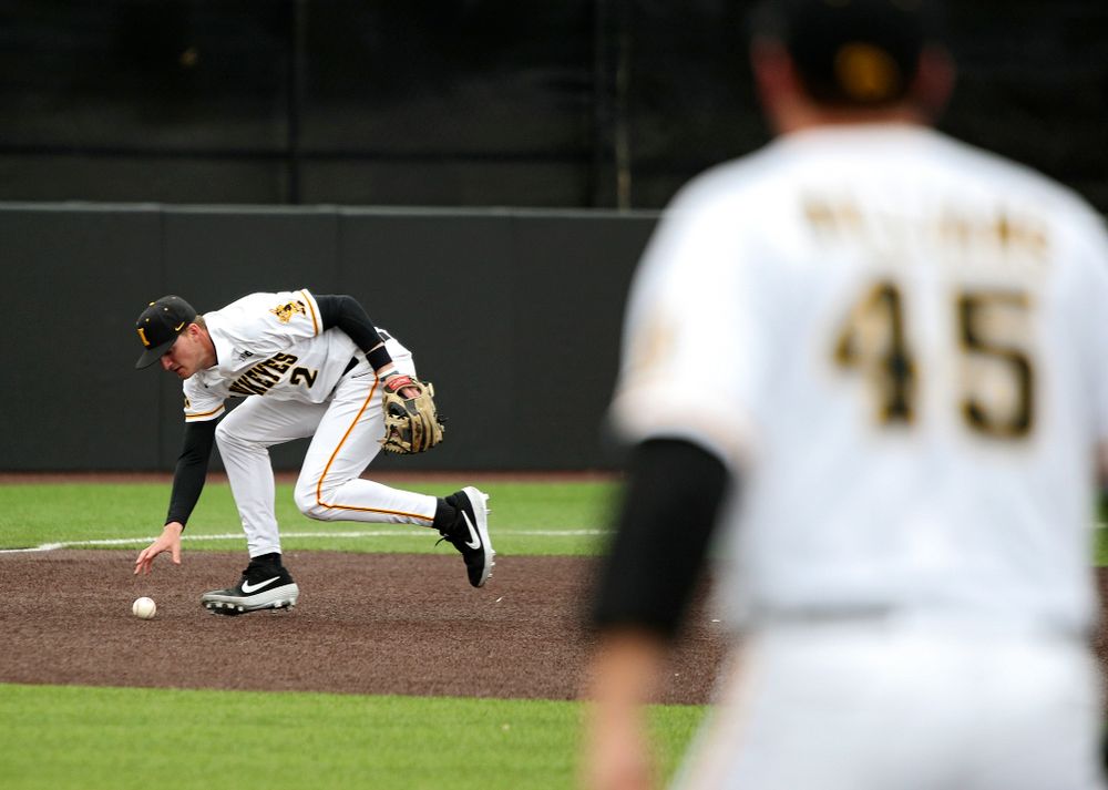 Iowa third baseman Brendan Sher (2) fields a ground ball before throwing to first for an out during the second inning of their college baseball game at Duane Banks Field in Iowa City on Wednesday, March 11, 2020. (Stephen Mally/hawkeyesports.com)
