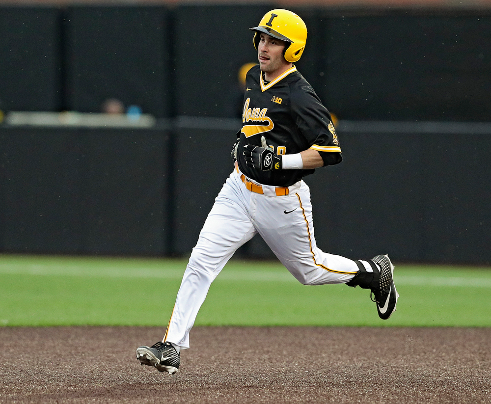 Iowa Hawkeyes left fielder Chris Whelan (28) runs to second base after hitting a double during the seventh inning of their game against Illinois State at Duane Banks Field in Iowa City on Wednesday, Apr. 3, 2019. (Stephen Mally/hawkeyesports.com)