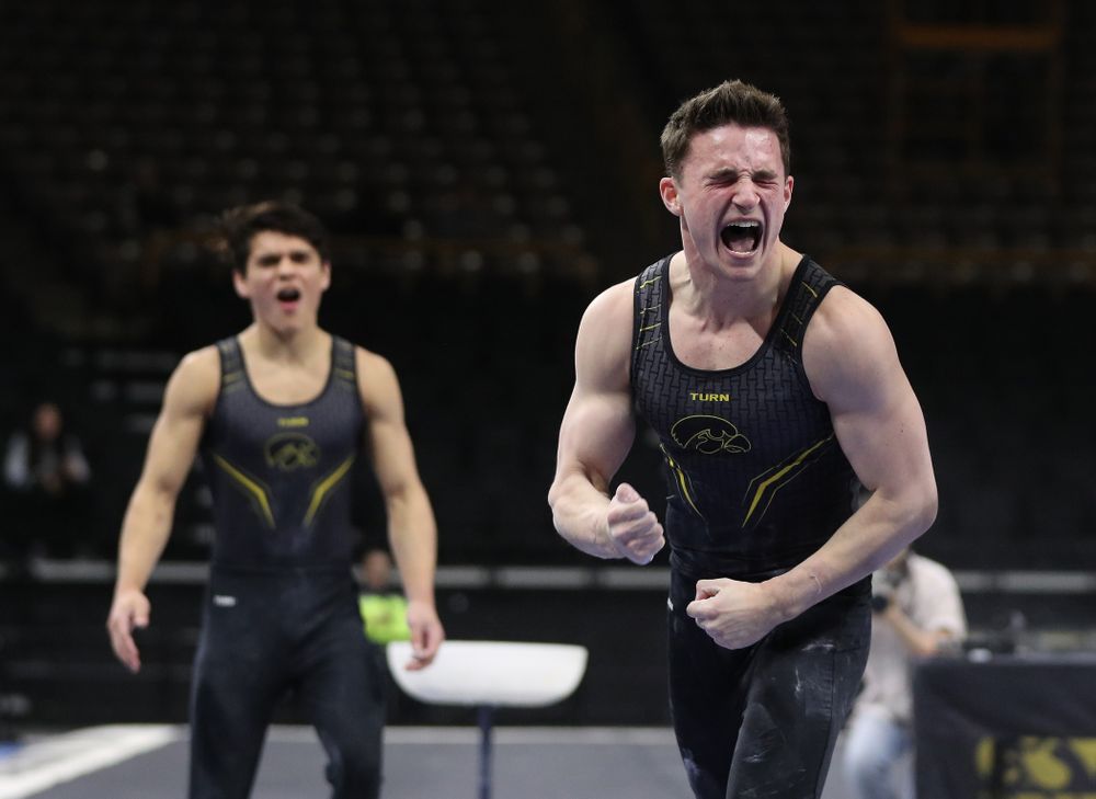 Iowa's Jake Brodarzon competes on the parallel bars against the Ohio State Buckeyes Saturday, March 16, 2019 at Carver-Hawkeye Arena. (Brian Ray/hawkeyesports.com)