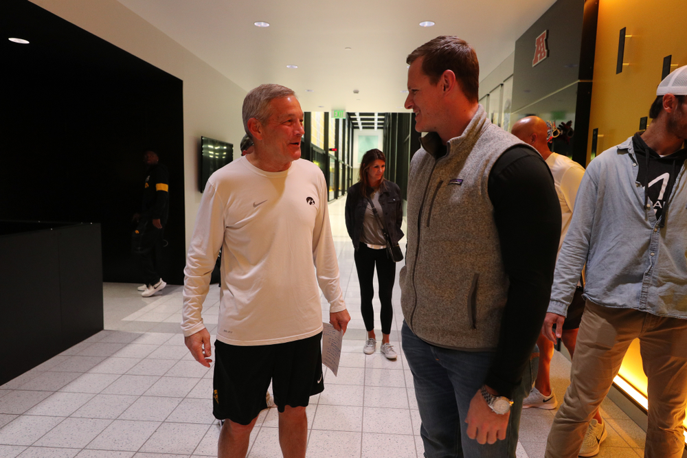 Iowa Hawkeyes head coach Kirk Ferentz talks with AJ Edds Friday, October 11, 2019 at the Hansen Football Performance Center. (Brian Ray/hawkeyesports.com)
