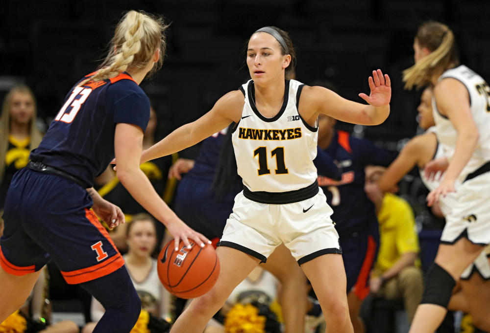 Iowa Hawkeyes guard Megan Meyer (11) defends during the fourth quarter of their game at Carver-Hawkeye Arena in Iowa City on Tuesday, December 31, 2019. (Stephen Mally/hawkeyesports.com)