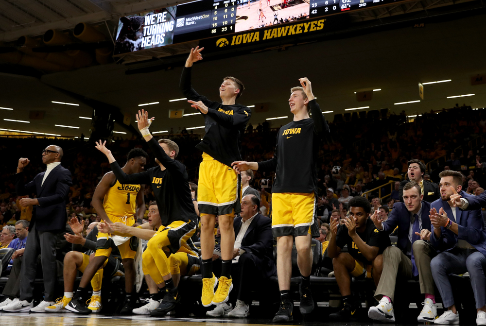 Iowa Hawkeyes guard Austin Ash (13) and forward Michael Baer (0) against the Rutgers Scarlet Knights Wednesday, January 22, 2020 at Carver-Hawkeye Arena. (Brian Ray/hawkeyesports.com)