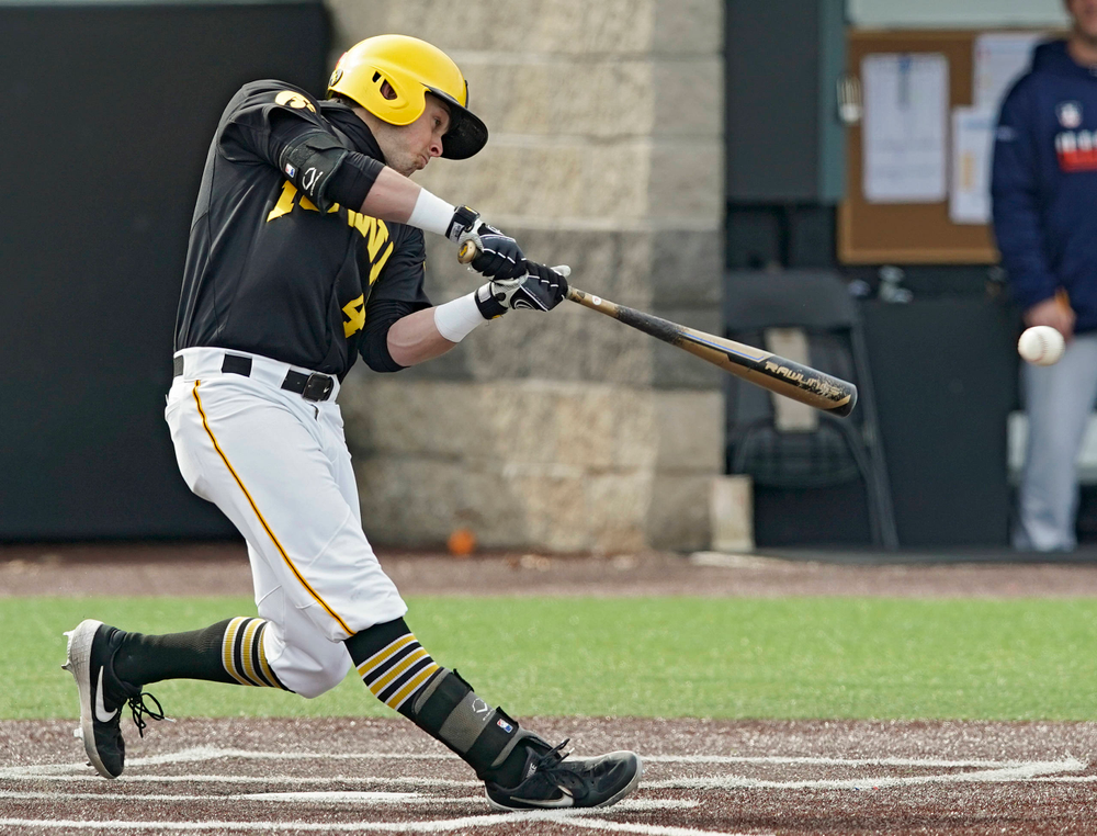 Iowa Hawkeyes second baseman Mitchell Boe (4) drives a pitch for a single during the fourth inning of their game against Illinois at Duane Banks Field in Iowa City on Saturday, Mar. 30, 2019. (Stephen Mally/hawkeyesports.com)