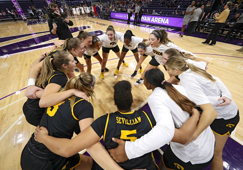 The Hawkeyes huddle before their game at Welsh-Ryan Arena in Evanston, Ill. on Sunday, January 5, 2020. (Stephen Mally/hawkeyesports.com)