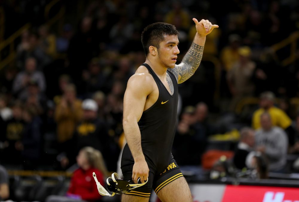 IowaÕs Pat Lugo wrestles WisconsinÕs Cole Martin at 149 pounds Sunday, December 1, 2019 at Carver-Hawkeye Arena. Lugo won the match 5-3. (Brian Ray/hawkeyesports.com)