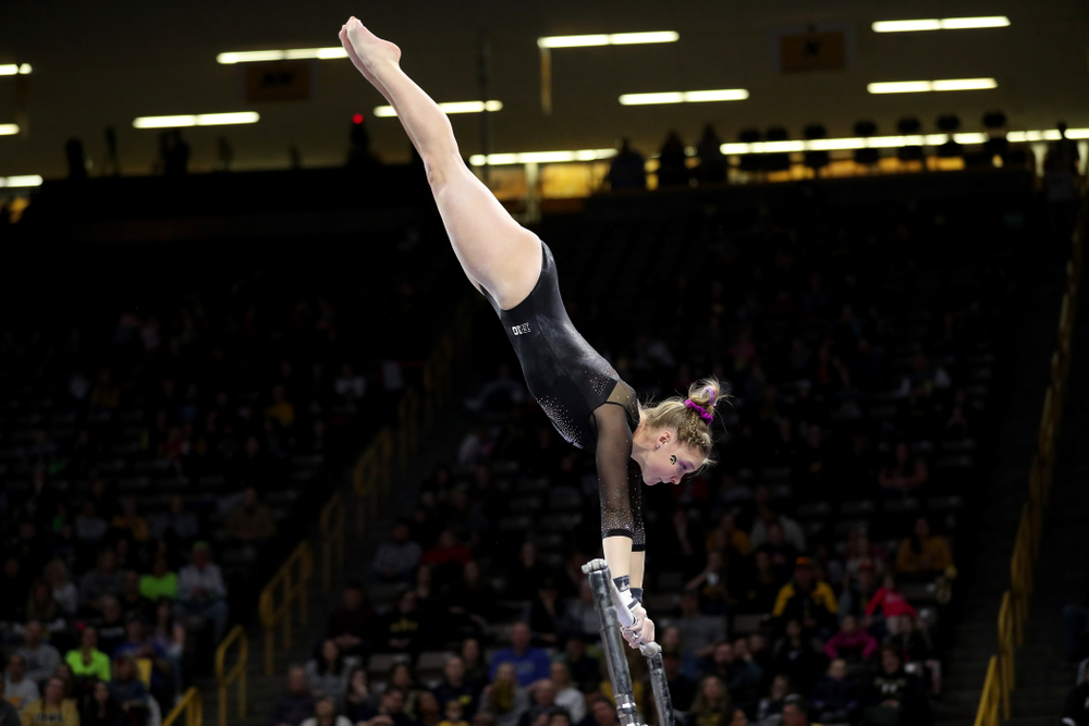 Iowa’s Allyson Steffensmeier competes on the bars against Michigan Friday, February 14, 2020 at Carver-Hawkeye Arena. (Brian Ray/hawkeyesports.com)