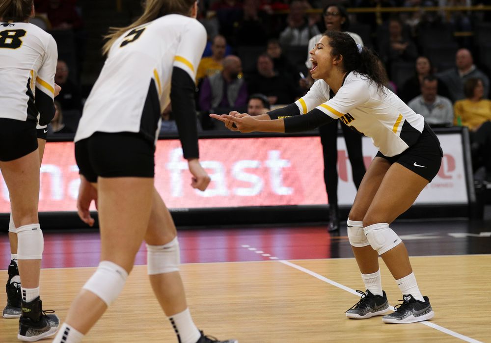 Iowa Hawkeyes setter Brie Orr (7) celebrates after winning a point during a match against Nebraska at Carver-Hawkeye Arena on November 7, 2018. (Tork Mason/hawkeyesports.com)
