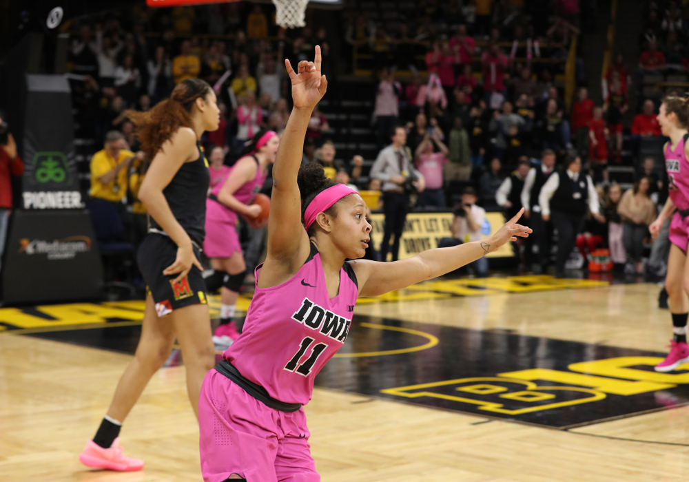 Iowa Hawkeyes guard Tania Davis (11) celebrates their victory against the seventh ranked Maryland Terrapins Sunday, February 17, 2019 at Carver-Hawkeye Arena. (Brian Ray/hawkeyesports.com)