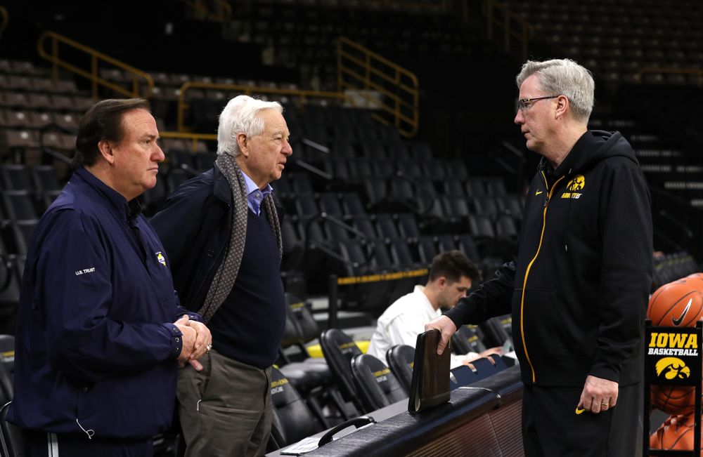 Iowa Hawkeyes head coach Fran McCaffery and assistant coach Kirk Speraw talk with television announcers Tim Brando and Bill Rafferty before their game against the Michigan State Spartans Thursday, January 24, 2019 at Carver-Hawkeye Arena. (Brian Ray/hawkeyesports.com)