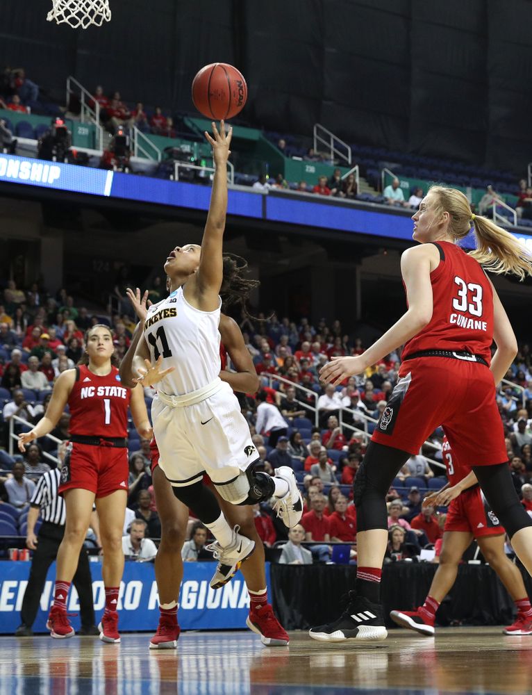 Iowa Hawkeyes guard Tania Davis (11) against the NC State Wolfpack in the regional semi-final of the 2019 NCAA Women's College Basketball Tournament Saturday, March 30, 2019 at Greensboro Coliseum in Greensboro, NC.(Brian Ray/hawkeyesports.com)