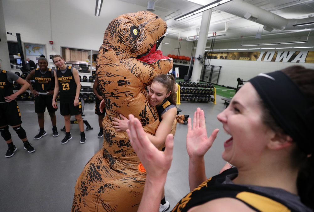 Iowa Hawkeyes head coach Lisa Bluder surprises her team during a workout dressed as a T-Rex for Halloween Wednesday, October 31, 2018 at Carver-Hawkeye Arena. (Brian Ray/hawkeyesports.com)