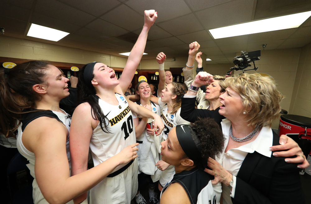 Iowa Hawkeyes forward Megan Gustafson (10) and head coach Lisa Bluder against the NC State Wolfpack in the regional semi-final of the 2019 NCAA Women's College Basketball Tournament Saturday, March 30, 2019 at Greensboro Coliseum in Greensboro, NC.(Brian Ray/hawkeyesports.com)