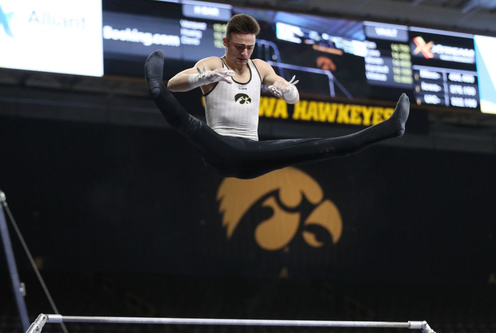 Iowa's Mitch Mandozzi competes on the high bar against UIC and Minnesota Saturday, February 2, 2019 at Carver-Hawkeye Arena. (Brian Ray/hawkeyesports.com)