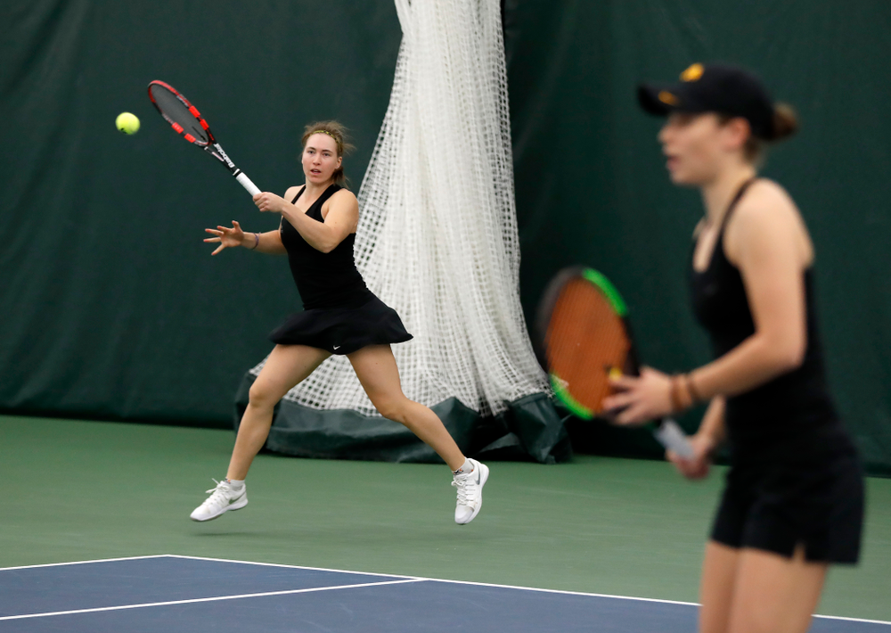 Elise Van Heuvelen and Anastasia Reimchen play a doubles match against Ohio State Sunday, March 25, 2018 at the Hawkeye Tennis and Recreation Center. (Brian Ray/hawkeyesports.com)