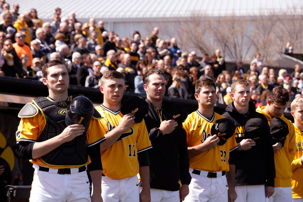 Iowa Hawkeyes catcher Brett McCleary (32), pitcher Cole McDonald (11), and pitcher Nick Allgeyer (24) before their game against the Michigan Wolverines Sunday, April 29, 2018 at Duane Banks Field. (Brian Ray/hawkeyesports.com)