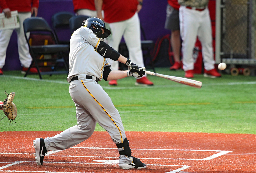 Iowa Hawkeyes outfielder Zeb Adreon (5) drives a pitch for a hit during the seventh inning of their CambriaCollegeClassic game at U.S. Bank Stadium in Minneapolis, Minn. on Friday, February 28, 2020. (Stephen Mally/hawkeyesports.com)