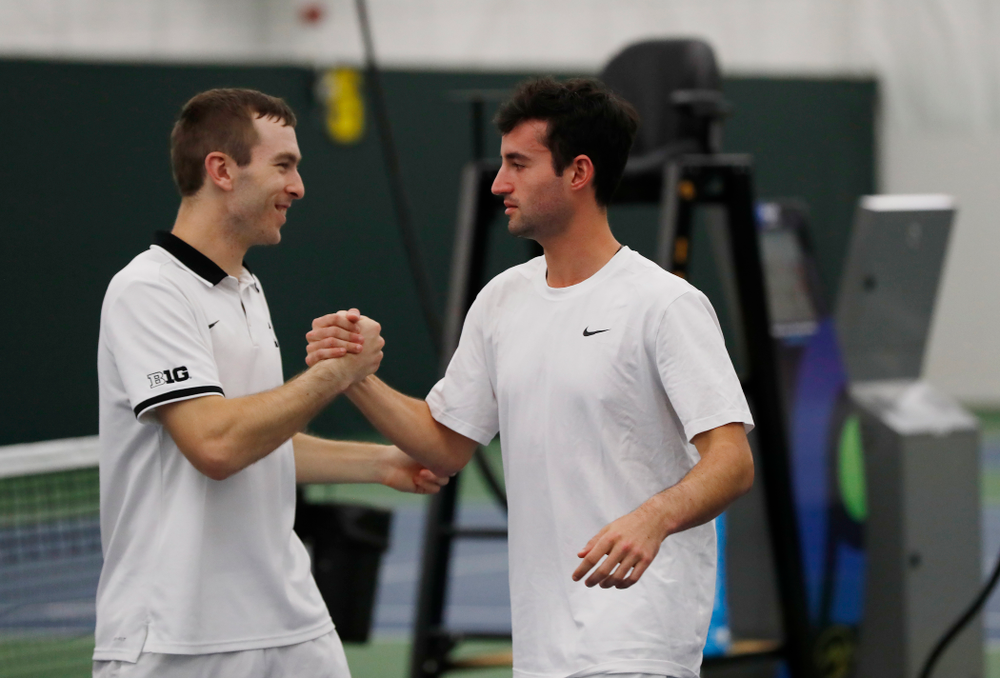 Jake Jacoby and Josh Silverstein during senior day activities following their match against Purdue Sunday, April 15, 2018 at the Hawkeye Ten