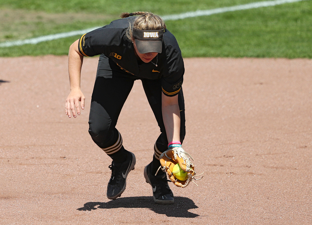 Iowa third baseman Sydney Owens (5) fields a ground ball during the first inning of their game against Ohio State at Pearl Field in Iowa City on Saturday, May. 4, 2019. (Stephen Mally/hawkeyesports.com)
