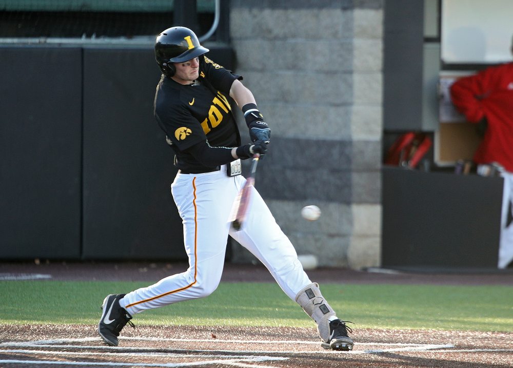 Iowa infielder Brendan Sher (2) drives a pitch during the second inning of their game at Duane Banks Field in Iowa City on Tuesday, March 3, 2020. (Stephen Mally/hawkeyesports.com)