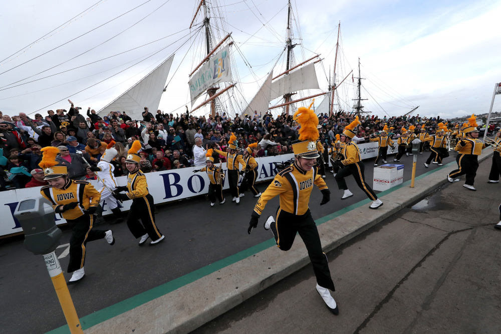 The Hawkeye Marching Band and the Iowa Spirit Squad march in the Holiday Bowl Parade Thursday, December 26, 2019 in San Diego. (Brian Ray/hawkeyesports.com)