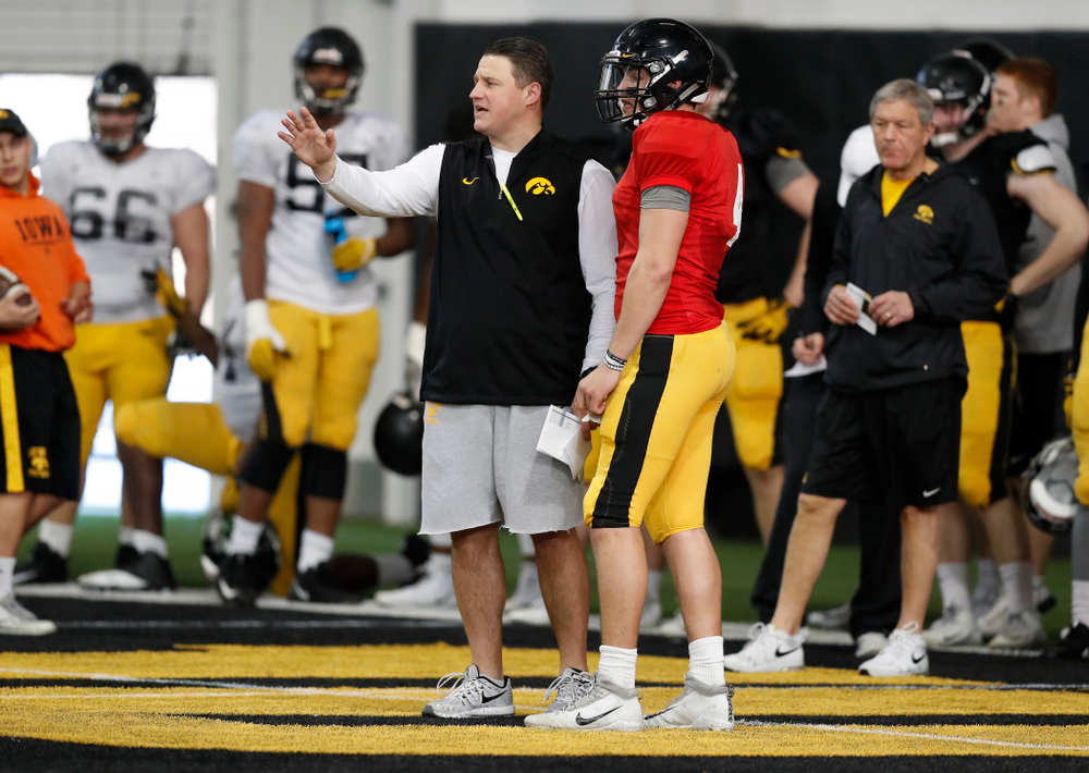 Iowa Hawkeyes offensive coordinator Brian Ferentz and quarterback Nathan Stanley (4) during spring practice Wednesday, March 28, 2018 at the Hansen Football Performance Center. (Brian Ray/hawkeyesports.com)