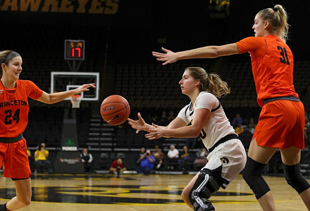 Iowa guard Kate Martin (20) passes the ball during the second quarter of their overtime win against Princeton at Carver-Hawkeye Arena in Iowa City on Wednesday, Nov 20, 2019. (Stephen Mally/hawkeyesports.com)