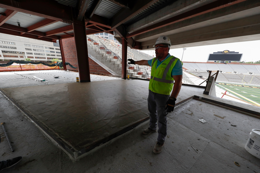 University of Iowa Senior Construction Project Manager Michael Kearns talks about the outdoor patio area in the northeast cover of the north end zone Wednesday, June 6, 2018 at Kinnick Stadium. (Brian Ray/hawkeyesports.com)