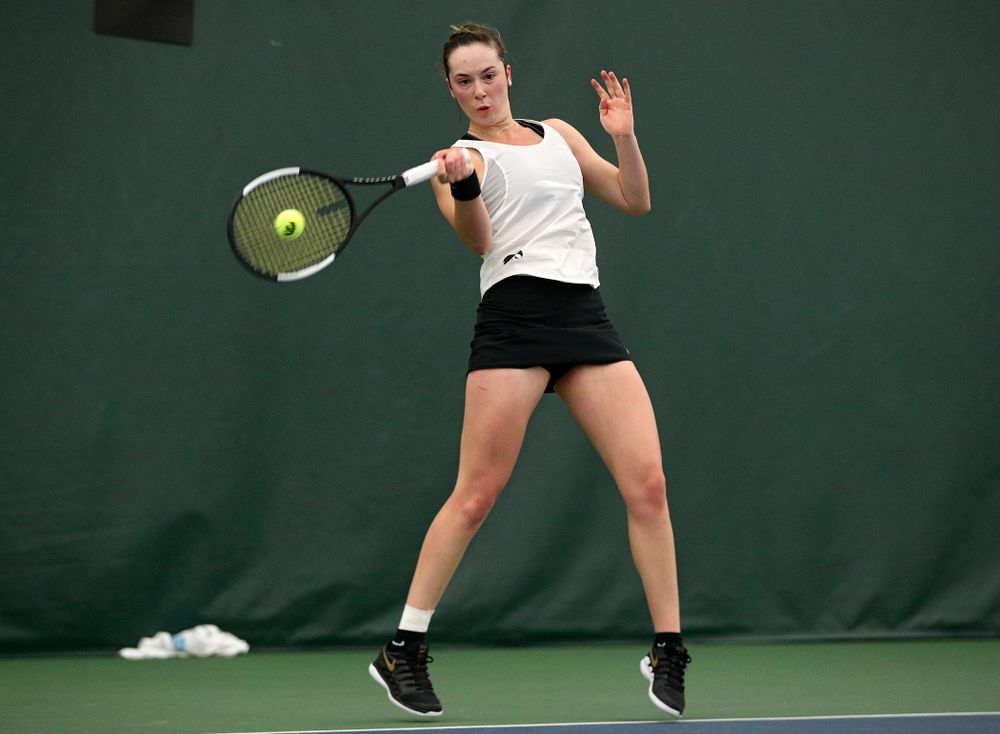 Iowa’s Samantha Mannix returns a shot during her singles match at the Hawkeye Tennis and Recreation Complex in Iowa City on Sunday, February 23, 2020. (Stephen Mally/hawkeyesports.com)