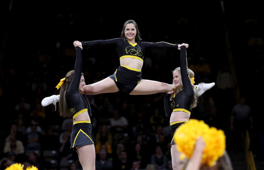 The Iowa Cheerleaders and Dance Team perform on senior night at half-time of the Iowa Hawkeyes game against the Purdue Boilermakers Tuesday, March 3, 2020 at Carver-Hawkeye Arena. (Brian Ray/hawkeyesports.com)