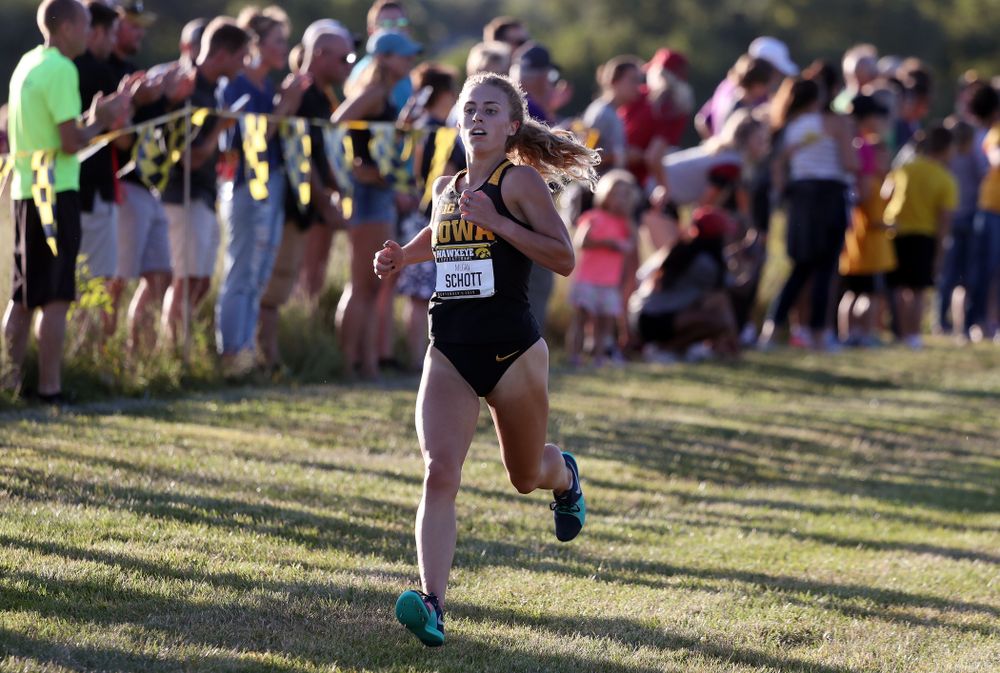 IowaÕs Megan Schott runs to the finish of the 2019 Hawkeye Invitational Friday, September 6, 2019 at the Ashton Cross Country Course. (Brian Ray/hawkeyesports.com)