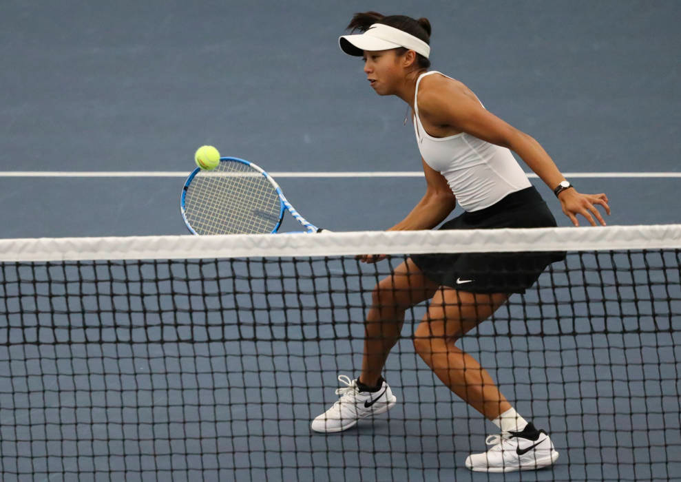 Michelle Bacalla plays the net in a doubles match during the second day of the ITA Central Regional Championships at the Hawkeye Tennis and Recreation Complex on October 13, 2018. (Tork Mason/hawkeyesports.com)