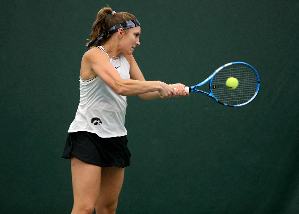 Iowa’s Ashleigh Jacobs returns a shot during her doubles match at the Hawkeye Tennis and Recreation Complex in Iowa City on Sunday, February 16, 2020. (Stephen Mally/hawkeyesports.com)