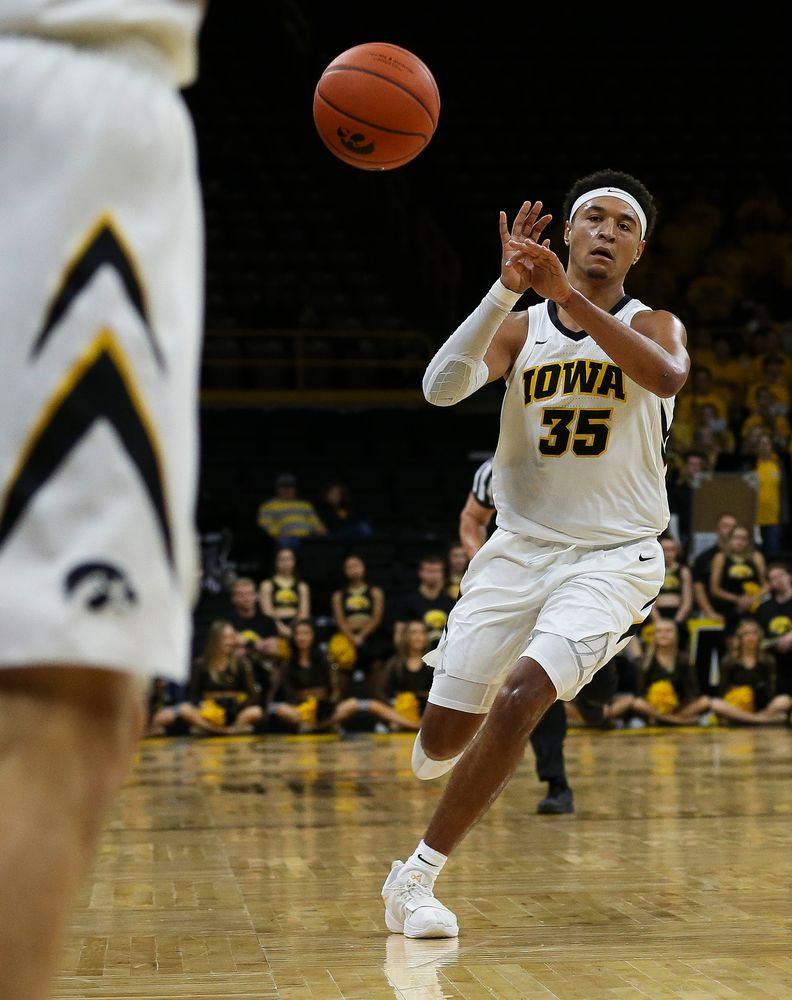 Iowa Hawkeyes forward Cordell Pemsl (35) passes the ball during a game against Guilford College at Carver-Hawkeye Arena on November 4, 2018. (Tork Mason/hawkeyesports.com)