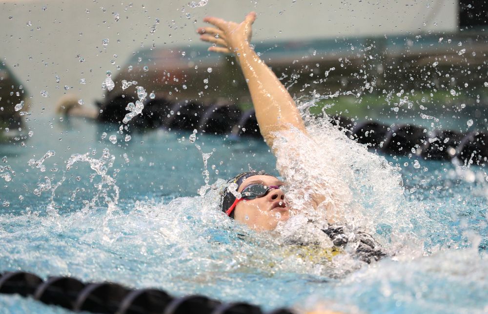 Iowa's Lauren McDougall swims the backstroke leg of the 200 yard medley relay during a double dual against Wisconsin and Northwestern Saturday, January 19, 2019 at the Campus Recreation and Wellness Center. (Brian Ray/hawkeyesports.com)