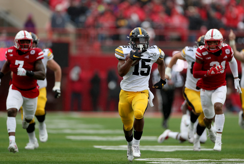 Iowa Hawkeyes running back Tyler Goodson (15) breaks free on a long touchdown run against the Nebraska Cornhuskers Friday, November 29, 2019 at Memorial Stadium in Lincoln, Neb. (Brian Ray/hawkeyesports.com)