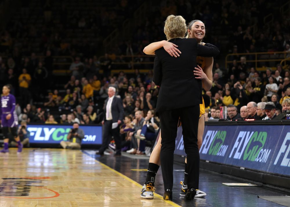 Iowa Hawkeyes forward Hannah Stewart (21) and head coach Lisa Bluder against the Northwestern Wildcats Sunday, March 3, 2019 at Carver-Hawkeye Arena. (Brian Ray/hawkeyesports.com)