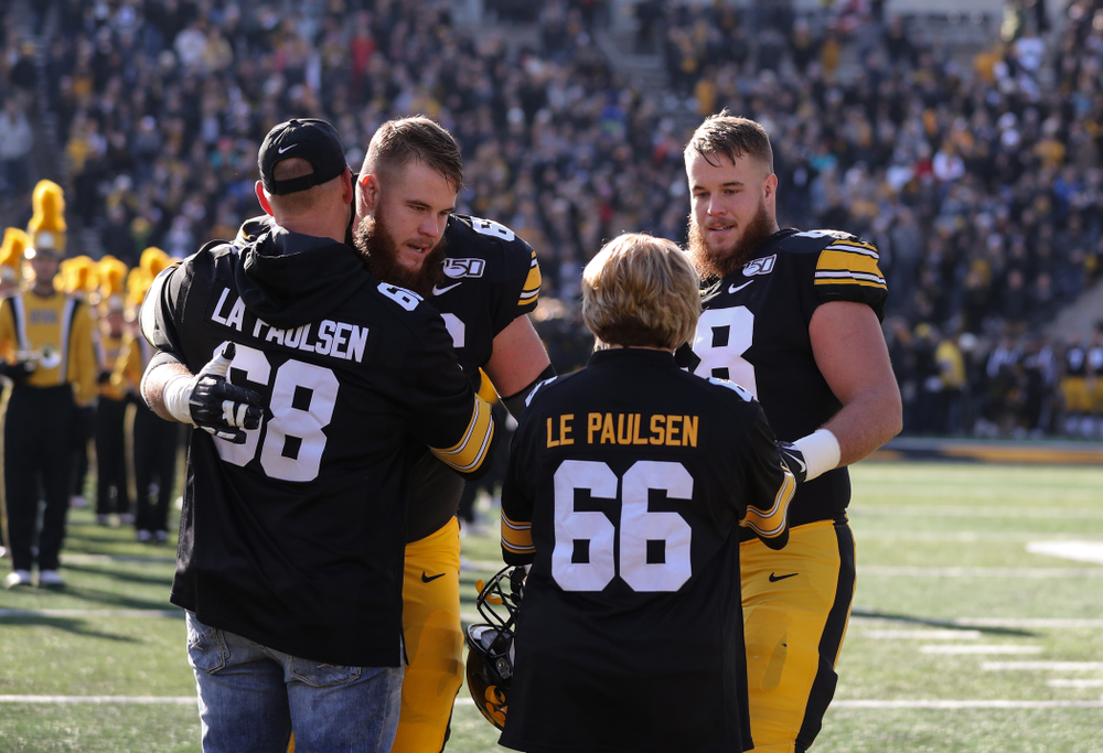 Iowa Hawkeyes offensive lineman Landan Paulsen (68) and offensive lineman Levi Paulsen (66) during Senior Day festivities before their game against the Illinois Fighting Illini Saturday, November 23, 2019 at Kinnick Stadium. (Brian Ray/hawkeyesports.com)