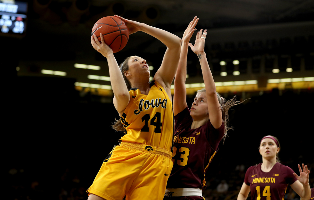 Iowa Hawkeyes forward McKenna Warnock (14) against the Minnesota Golden Gophers Thursday, February 27, 2020 at Carver-Hawkeye Arena. (Brian Ray/hawkeyesports.com)