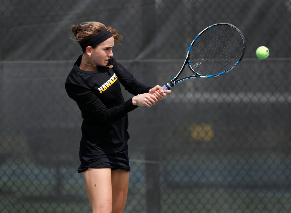 Iowa's Adrienne Jensen against the Wisconsin Badgers Sunday, April 22, 2018 at the Hawkeye Tennis and Recreation Center. (Brian Ray/hawkeyesports.com)